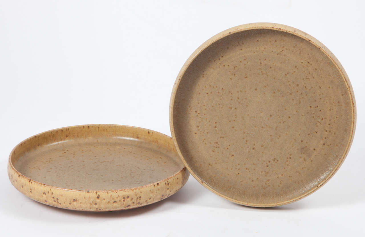 Vintage 1960s Palshus stoneware platters, pair by Per Linnemann Schmidt

This pair of vintage ceramic plates are in like new condition. Decorative but still good to use to store fruit or nuts. Beautiful addition to any ceramic collection. Ready