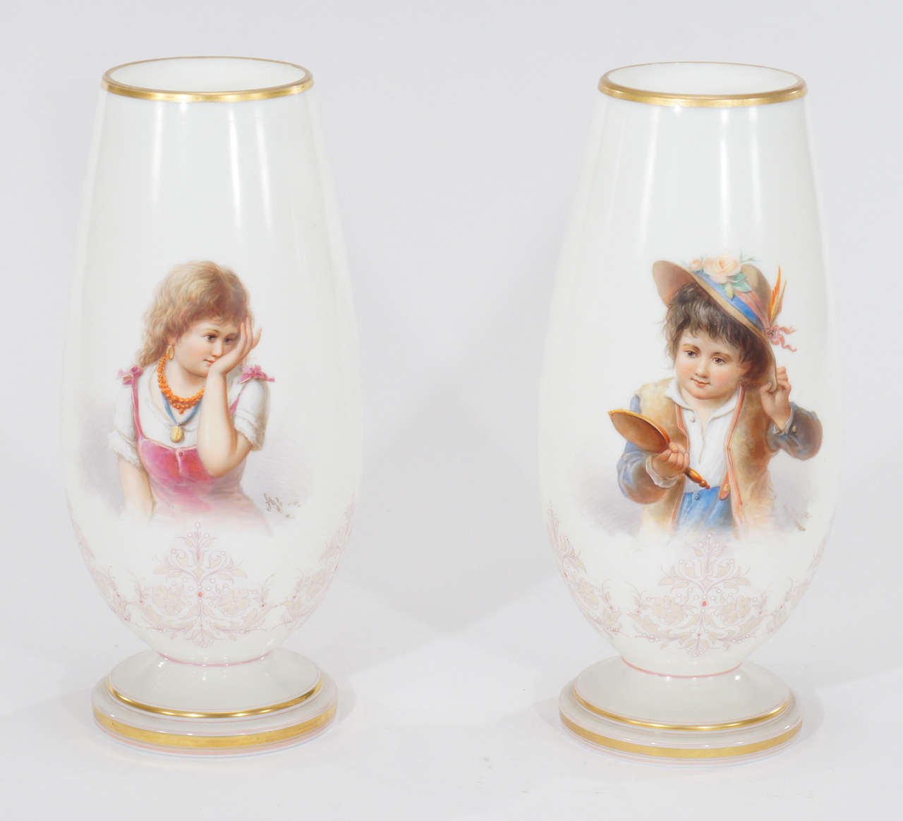 This is a wonderful pair of hand blown Bohemian glass vases with detailed and charming portraits in hand painted enamels. The large size makes them especially decorative and the fine detail of the painting is clearly evident. The children are well