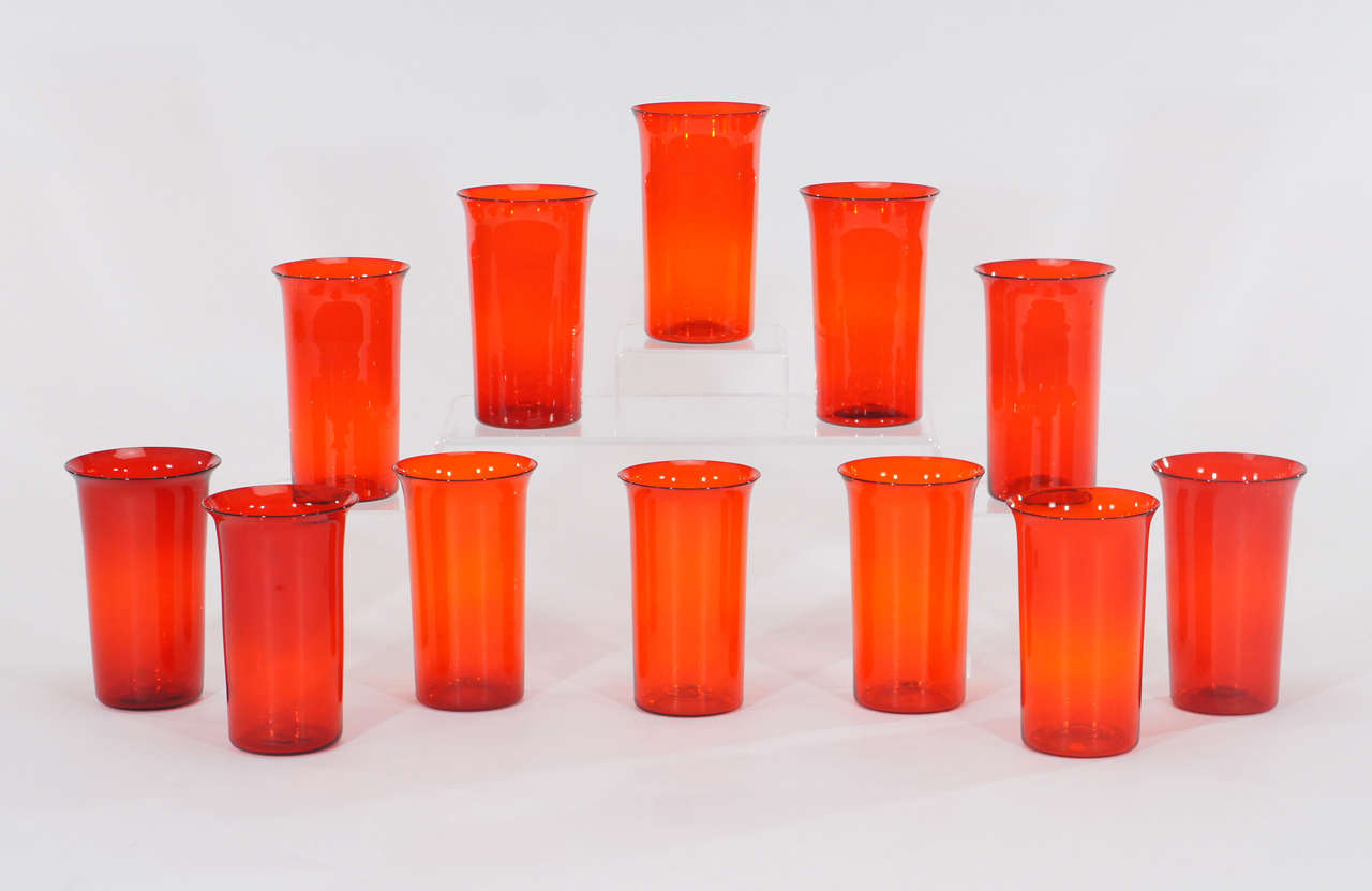 The color of the set of 12 hand blown tumblers will certainly get plenty of attention! Bright red with a hint of tangerine, these popular size and shaped goblets will be the go-to accent for all your summer entertaining.
Nice and large, perfect for