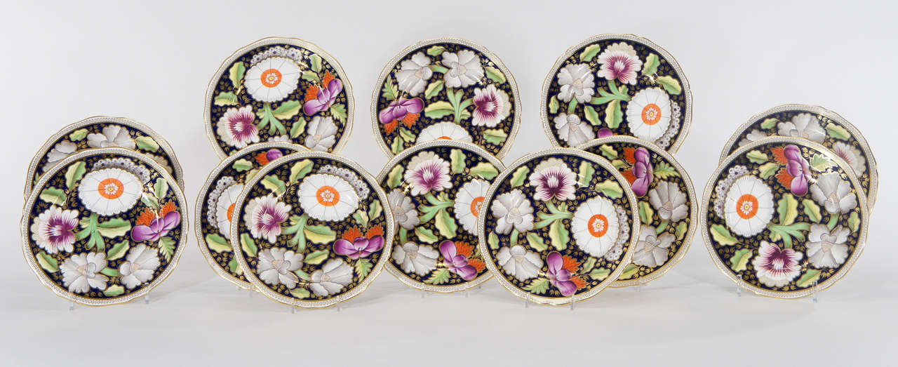 These 12 porcelain dessert plates demonstrate the best of both design worlds.
Incorporating an early 19th century Imari motif with a combination of jewel-tone enamel colors, these evoke both a traditional yet up to date, modern aesthetic.
