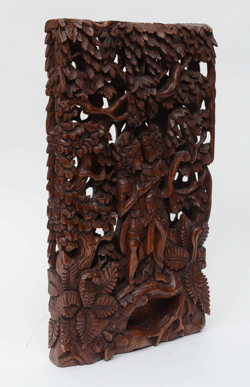 Wonderful wall hanging with intricate carvings in Suar wood. Original restored condition
Originally $ 950.00

Suar wood  is an average hardwood with a straight grain making it easy to carve and finish with a high gloss. It is a native rain tree