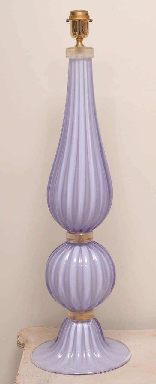 Beautiful and heavy handblown Italian Murano glass lamp. The glass was blown in a beautiful and unique soft lavender color. 