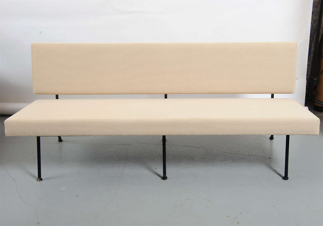 Upholstered sofa with enameled steel legs produced by Knoll associates for Florence Knoll in 1965.