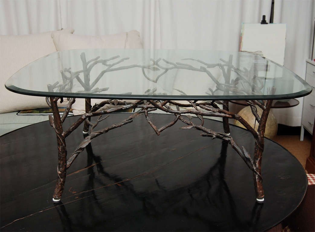 A unique glass top coffee table. With its square 1/4