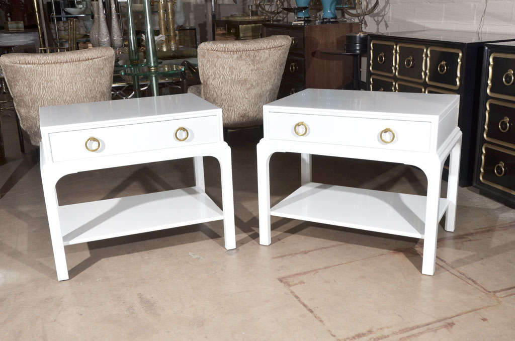 Pair of Kittinger side tables with brass ring pulls in newly lacquered white finish.
