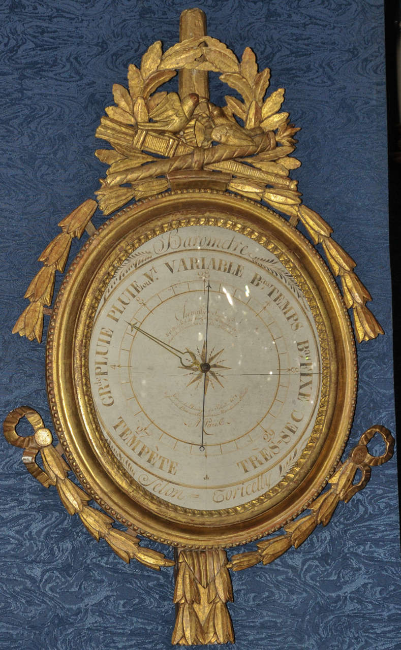 18th century Louis XVI period barometer, in gilded wood and glass. Signed on the face by 