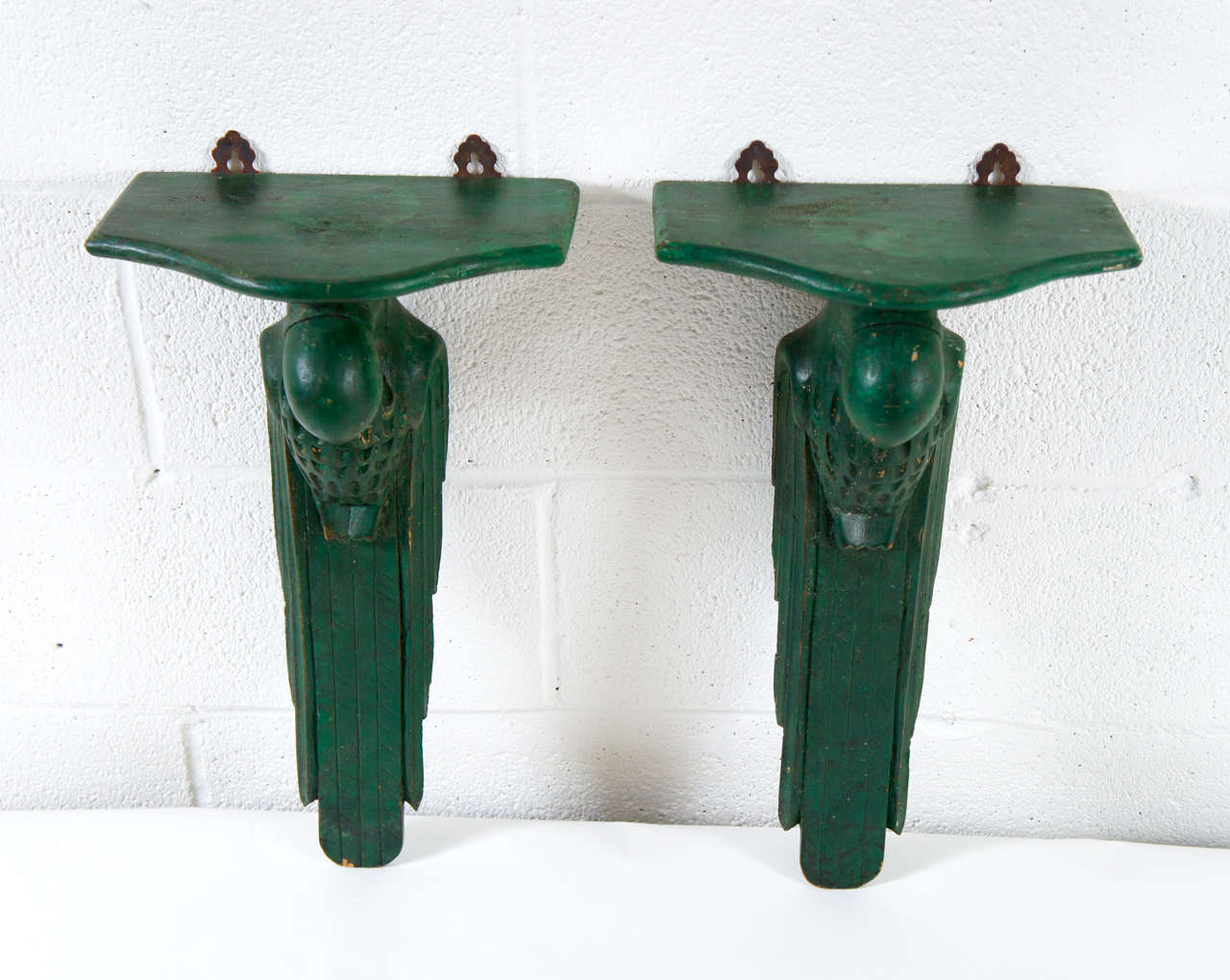 Here is a charming pair of green parrot wall brackets.