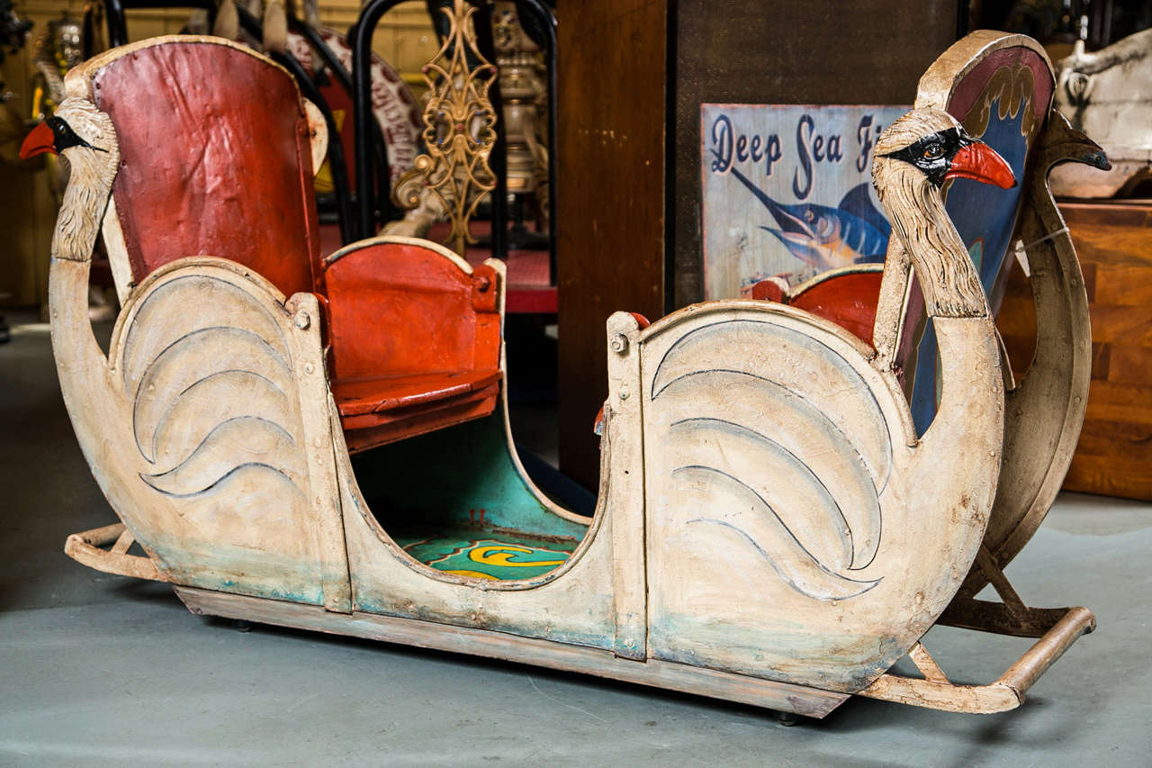 This amusement park ride represents a great piece of folk art history.  It is made of metal and wood.  It has been totally restored.  A beautiful piece of 