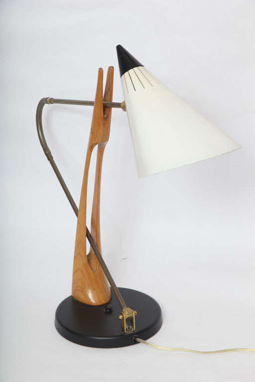 A rare 1950s articulated table lamp attributed to Gino Sarfatti for Lightolier.