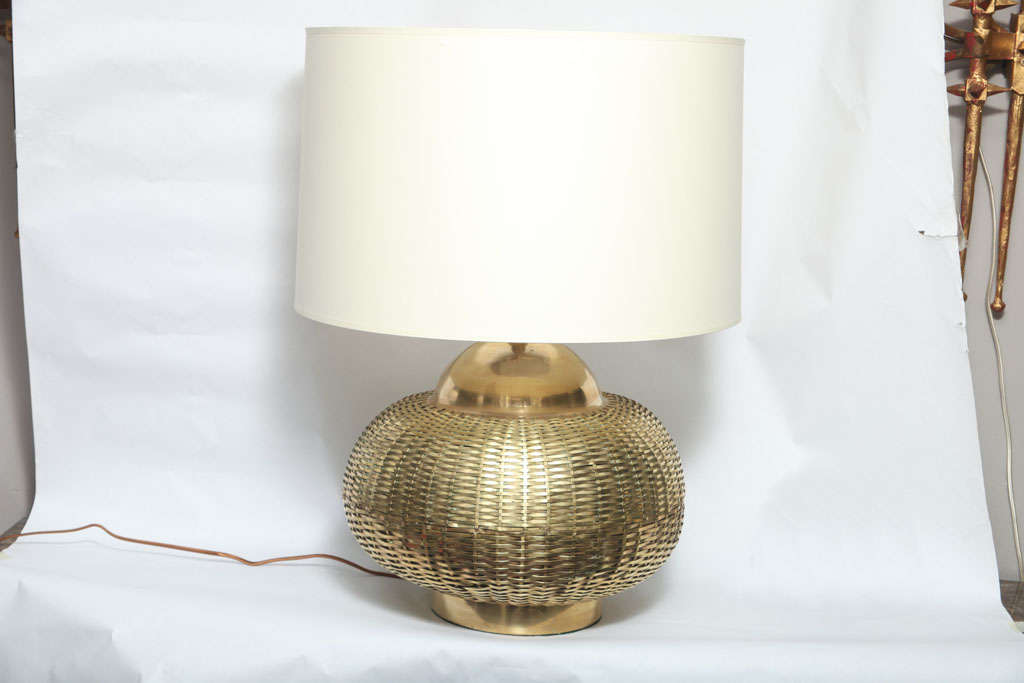 A 1960s sculptural brass basket weave table lamp
New sockets and rewired
Shade not included