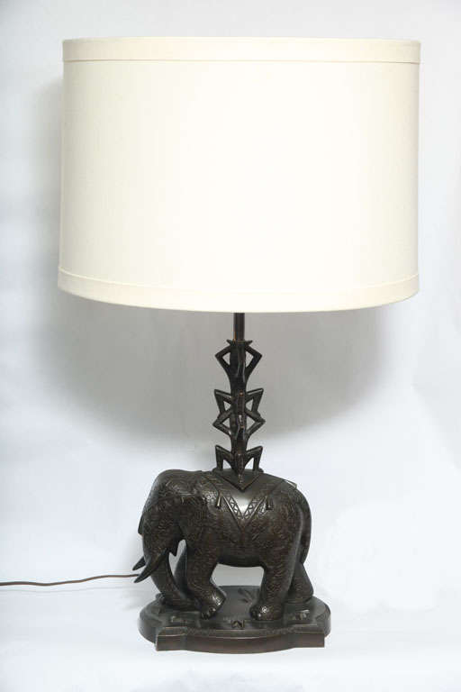 A 1920s German Art Deco bronze table lamp Elephant mounted by stacking men signed H Troger.
New sockets and rewired
Shade not included