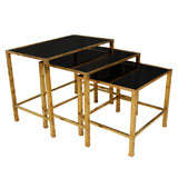A SET OF MID-CENTURY NESTING TABLES