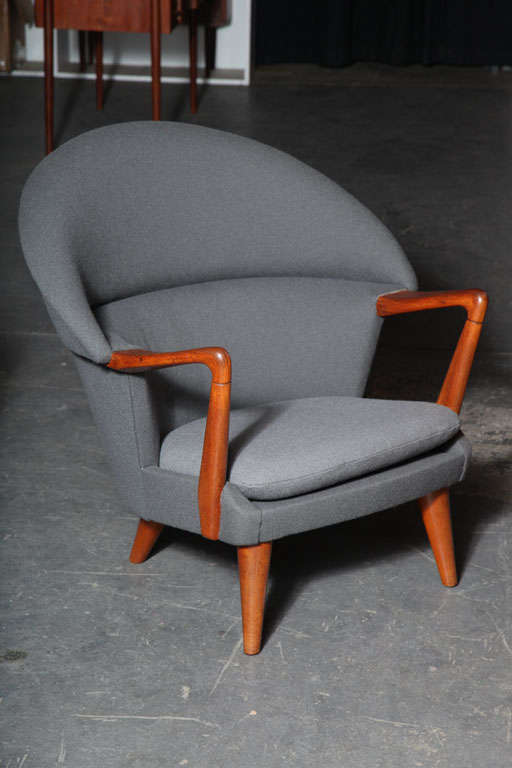 Plush and Generously-proportioned Danish Modern Shell Armchair with exposed teak arms and legs by Hans Olsen.  Newly upholstered in a 2-toned gray fabric.