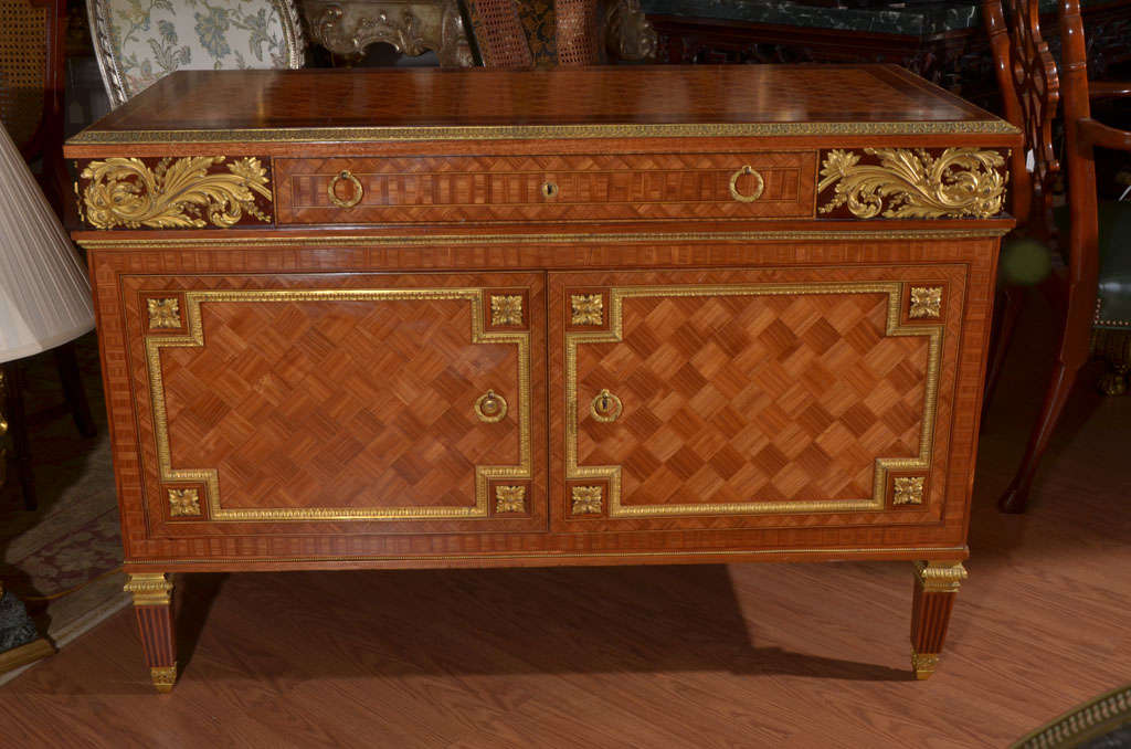 19th c French Louis XVI  kingwood parquetry chest with bronze dore mounts.