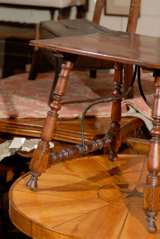 Wood Petite 19th Century, Spanish Fratino Table with Iron Stretcher and Turned Legs