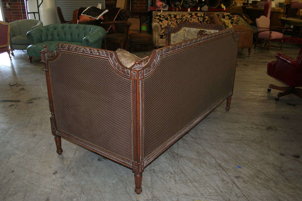SOFA-DAYBED..ITALIAN BEECHWOOD  HAND  CARVED  FRAME. FINISH IS  HAND RUBBED BURNISHED BROWN. INSIDE COVER IS COTTON AND SILK JACQUARD..OUTSIDE A BOUCLAY DOT..TWO PILLOWS ARE IRISH CREAM REAL HAIR HYDE AND THREE ARE A BURNISHED CORRON  STRIPE WITH