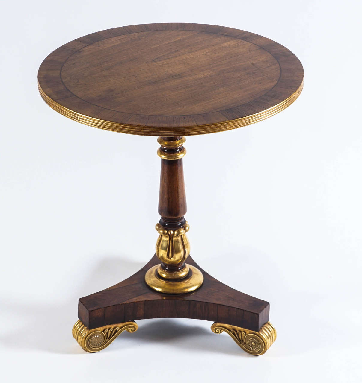 Regency Parcel Gilt Rosewood Occasional Table in the Manner of Morel & Hughes