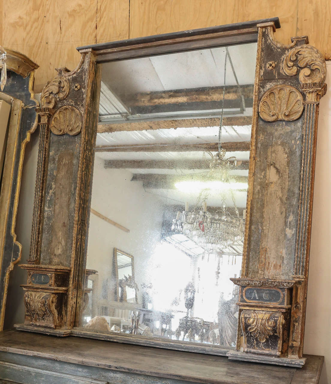 This grandiose Spanish 17th century mirror was made up from Altar Fragments. Beautiful deep blue, gold, and white painted detailing and exquisite carving make this piece so special.