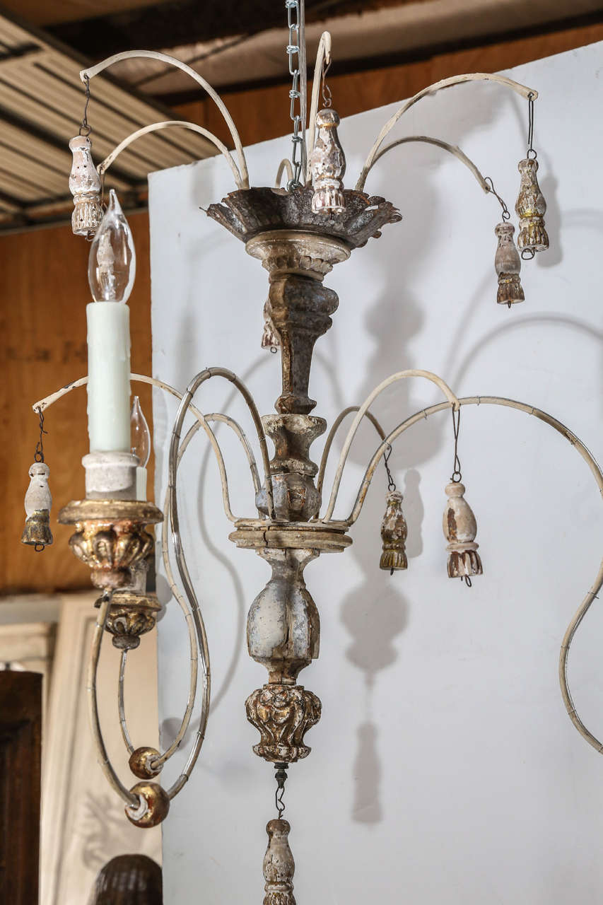 Italian Wood Carved Gilt Spider Chandelier Made With 18th Century Italian Wood Carved Gilt Spider Chandelier Made With 18th Century And New Parts In Good Condition