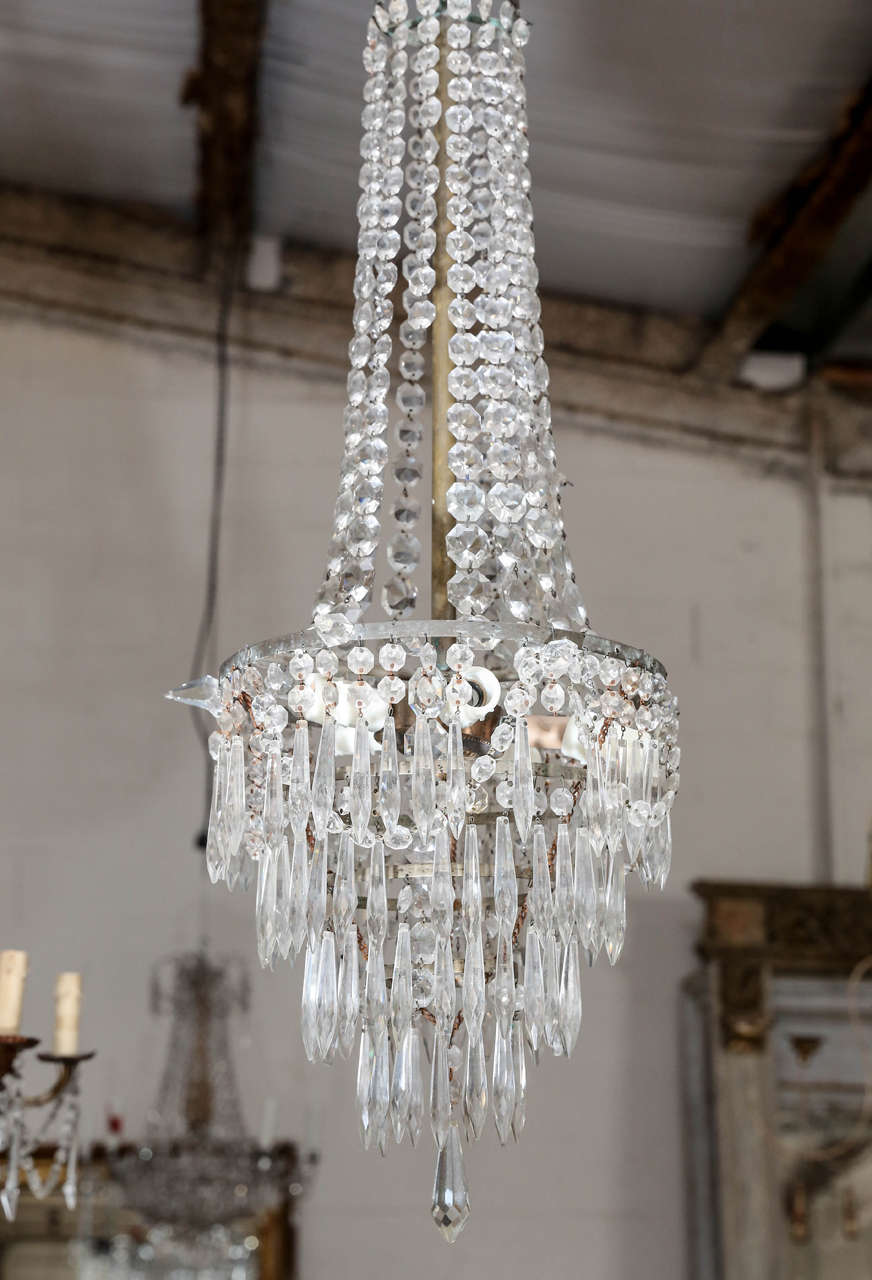 Beautiful vintage Italian cascading, crystal chandelier with five bulbs.