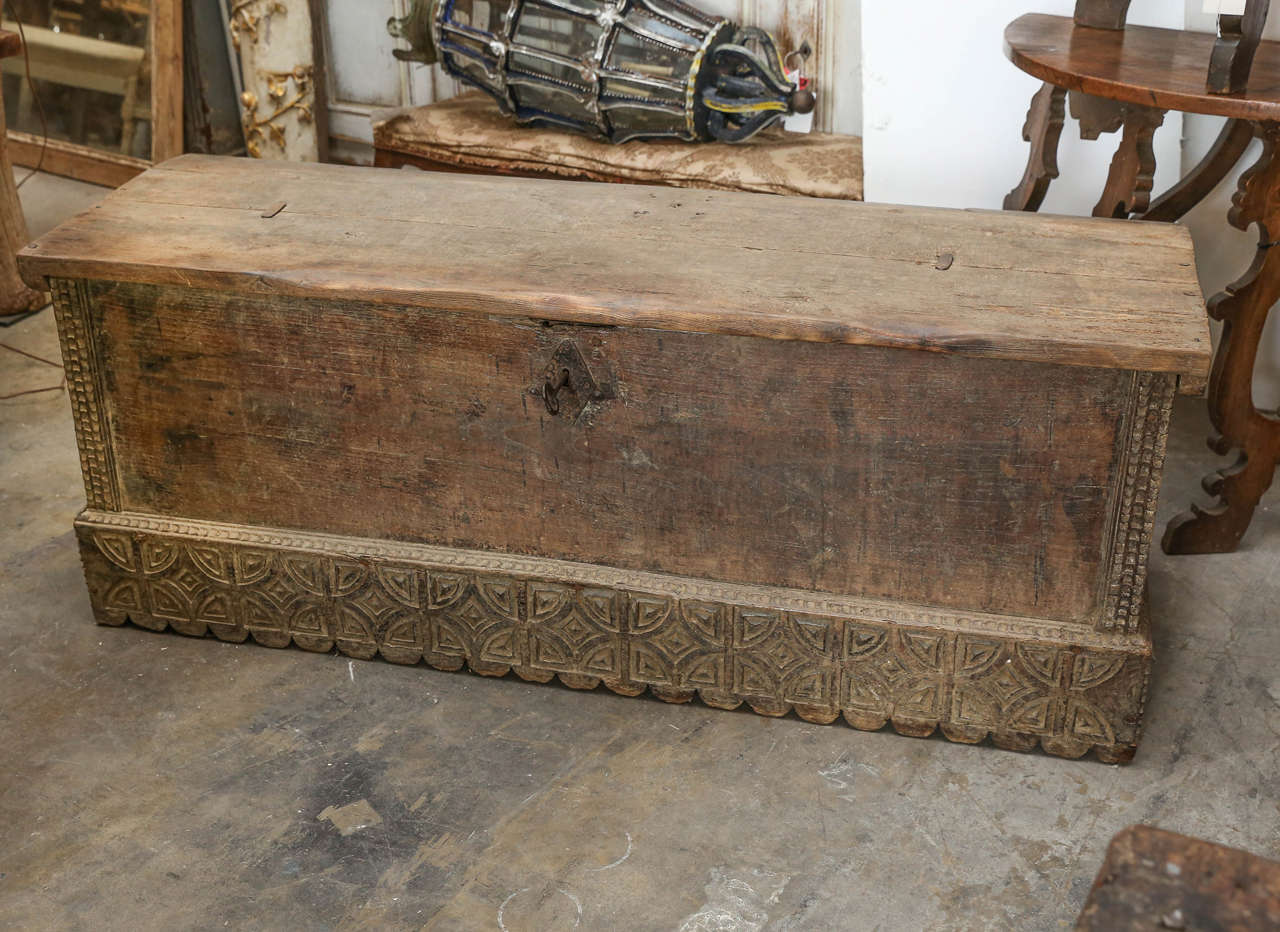 This is a beautiful faded wooden Spanish trunk from the 17th century original lock but key is missing.