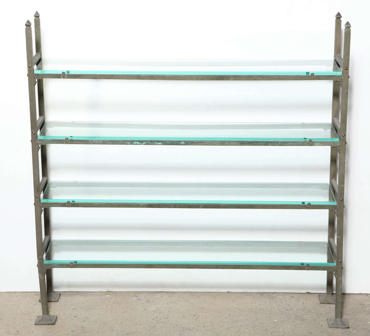 Late 19th Century Brass Edwardian Bread Rack repurposed with four new Beveled Glass Shelves. Featuring a nicely weighted rectangular ladder form in patinated Brass, pyramid top corner details and sturdy square feet.  Beveled glass shelves measure: 7