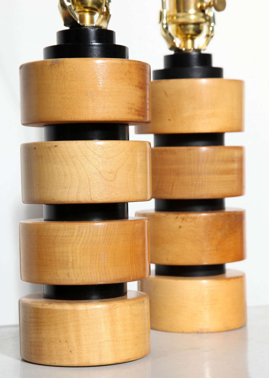 Mid-20th Century Pair of Russel Wright Style Machine Age Stacked Maple and Black Bedside Lamps