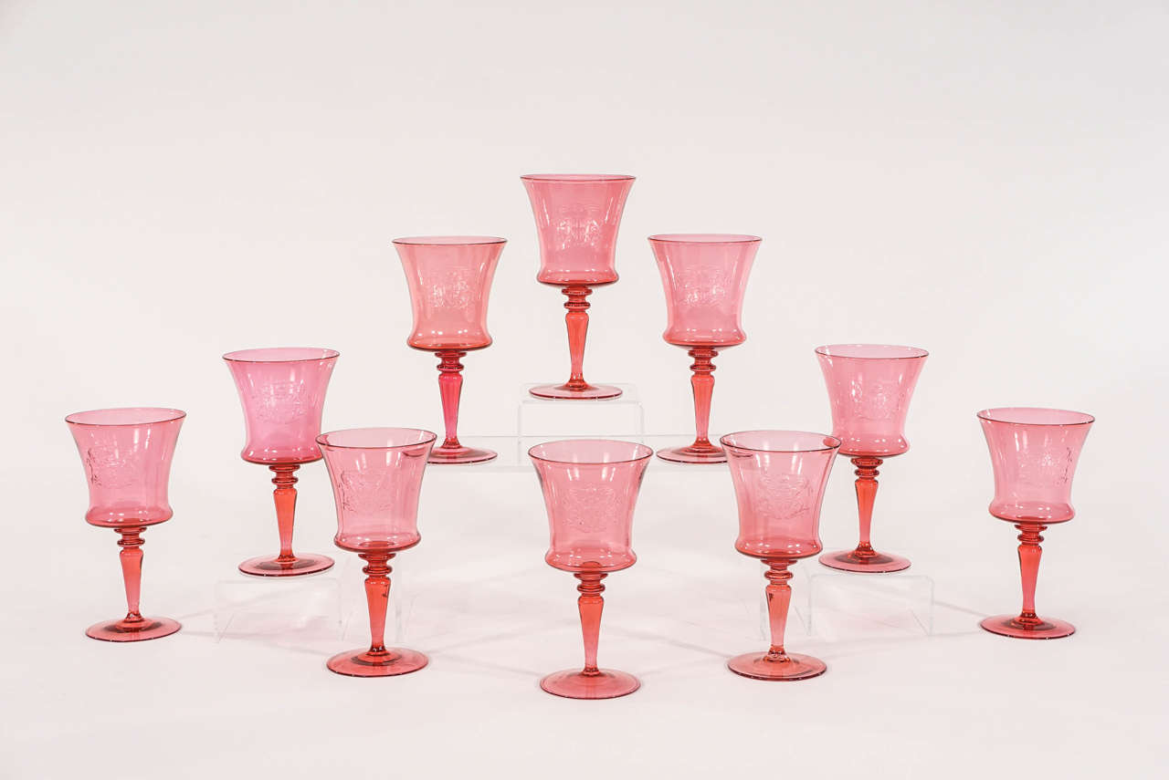 An unusual and rare set of ten Steuben large goblets in handblown crystal. The goblets have simple, elegant lines and proportions and one color throughout- Frederic Carder's Steuben iconic 