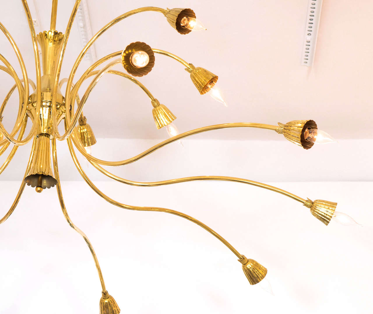 Brass two-tier curvilinear chandelier In Good Condition In New York, NY