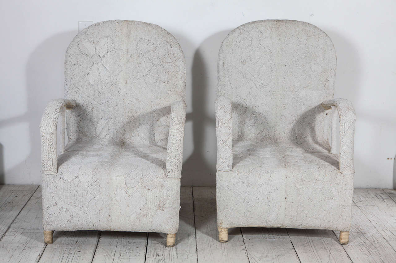 Yoruba chairs in rare all white beading. Sold as pair.