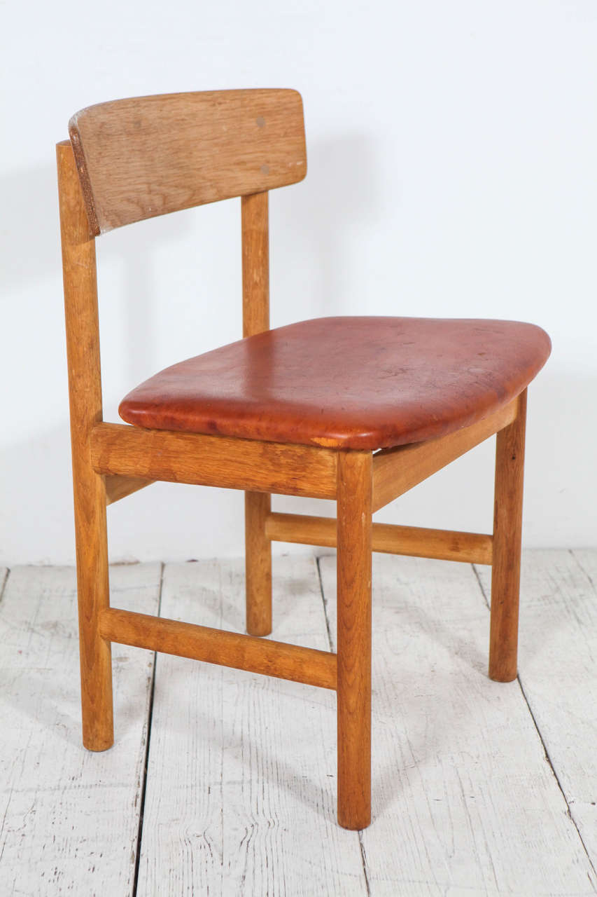 Set of four Borge Mogensen Oak and Leather Curved Back Sound Series Dining Chairs. Original leather recently restored. Frames in good condition, some cracking.
