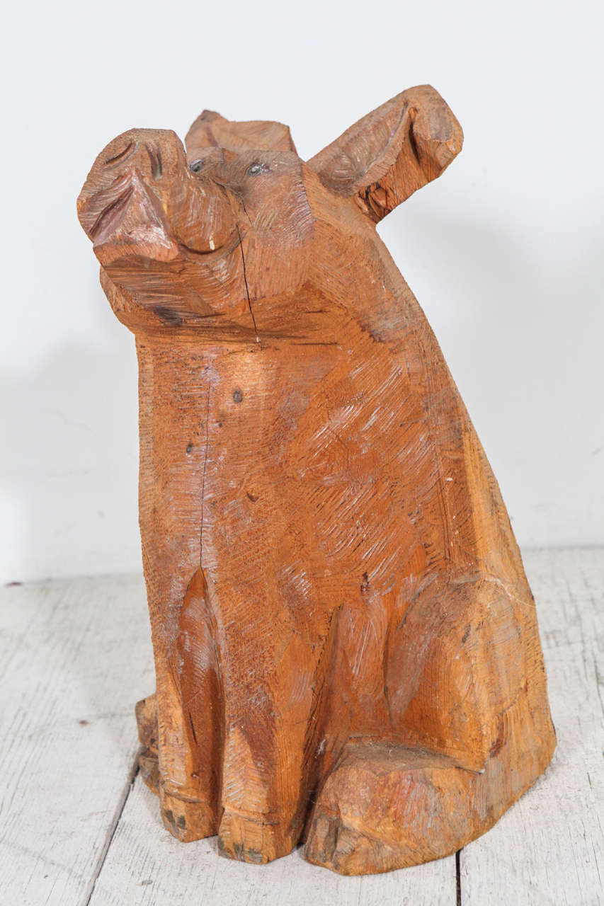 Carved Smiling Pig Statue