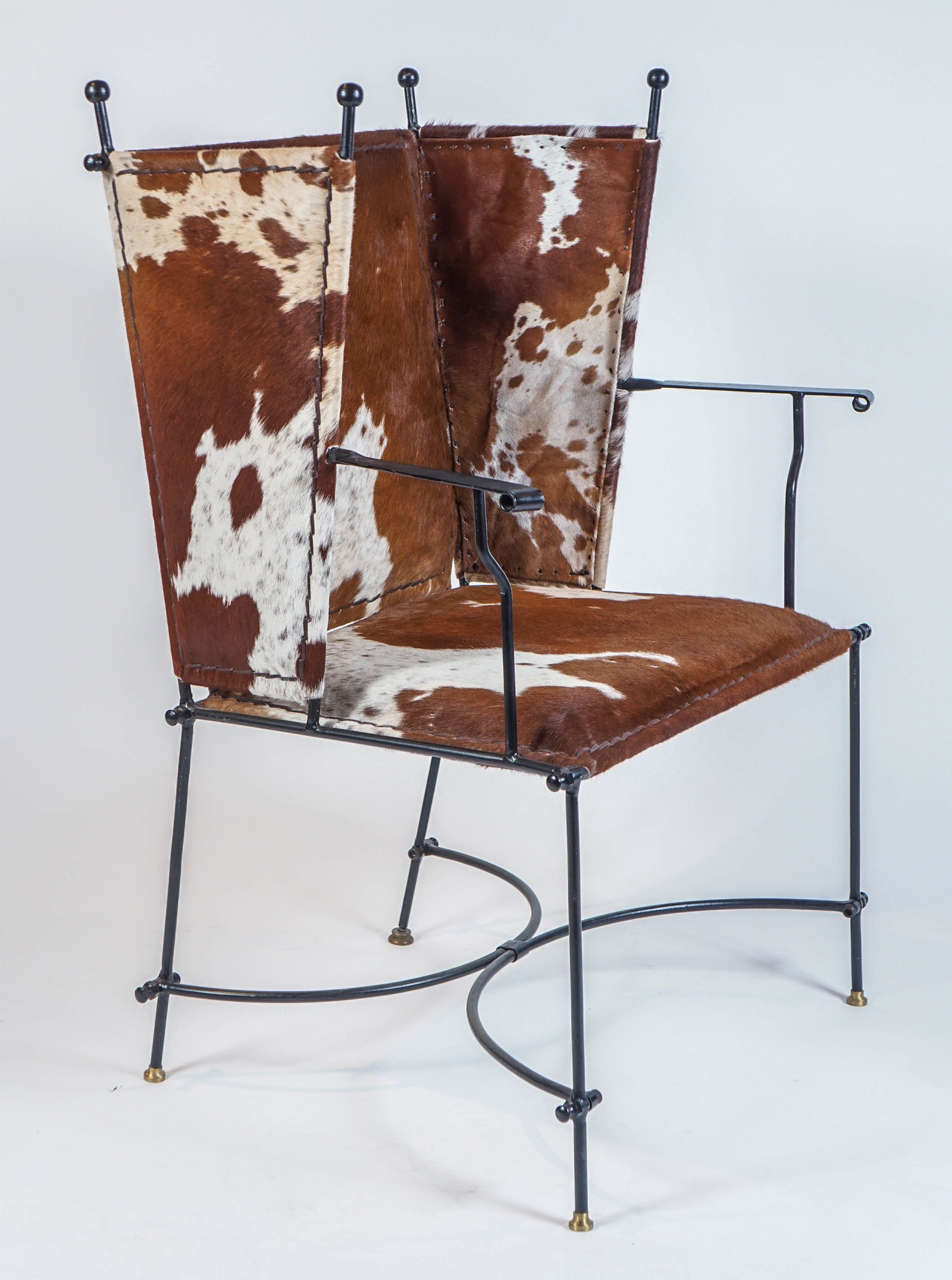 Pair of Iron and Cowhide Wing Chairs 1