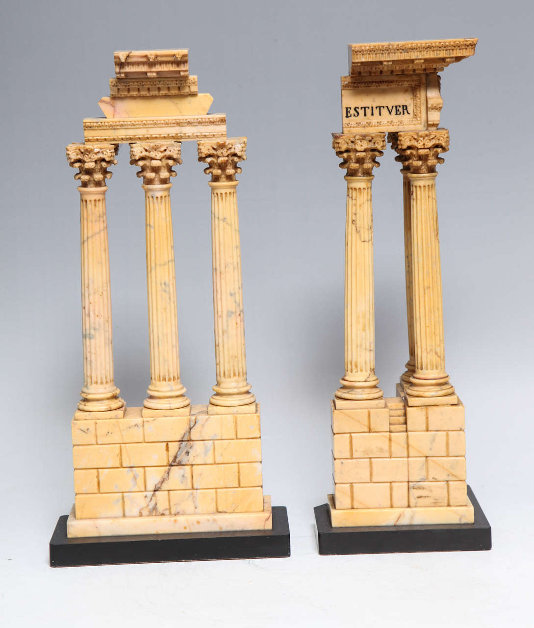 A very fine and early pair of Roman Neoclassical Period Grand Tour Sienna marble models of the Temple of Castor and Pollux and the temple of Vespasian, early 1800's Italian.

In the 18th and 19th centuries no gentlemen's education was considered