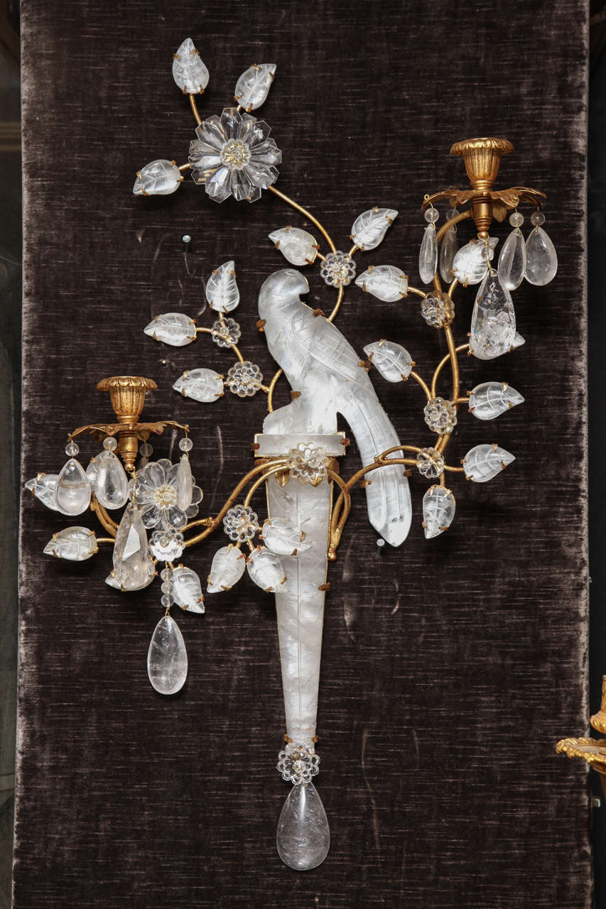 This Pair of superb antique French Louis XVI gilt bonze & cut rock crystal double light Parrot wall sconces by , each sconces is embellished with a cut rock crystal parrot in the center embellished with cut rock crystal flowers, leaves & finally