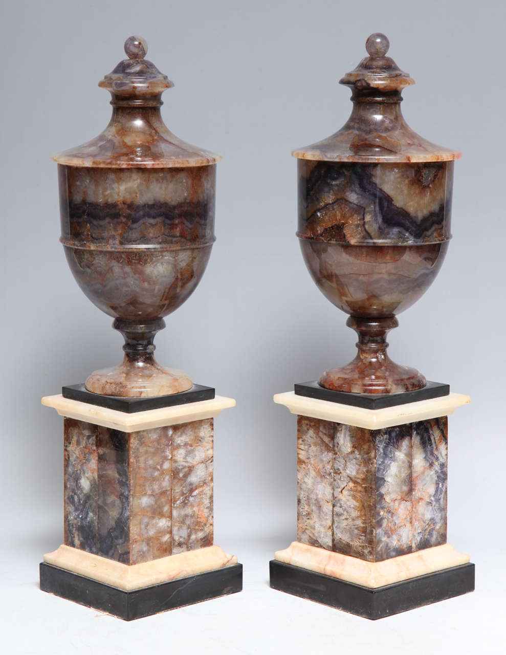 A Fine Pair of Antique English Blue John Vases on Stands