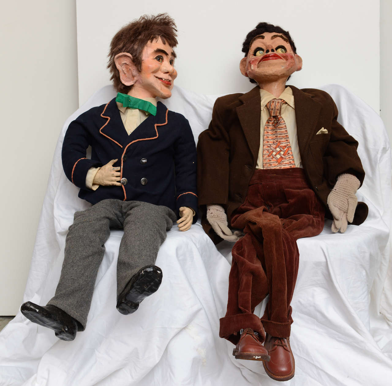 Fabulous pair if vintage ventriloquist dummies in period clothing. Moveable eyes, eyelids and lips.