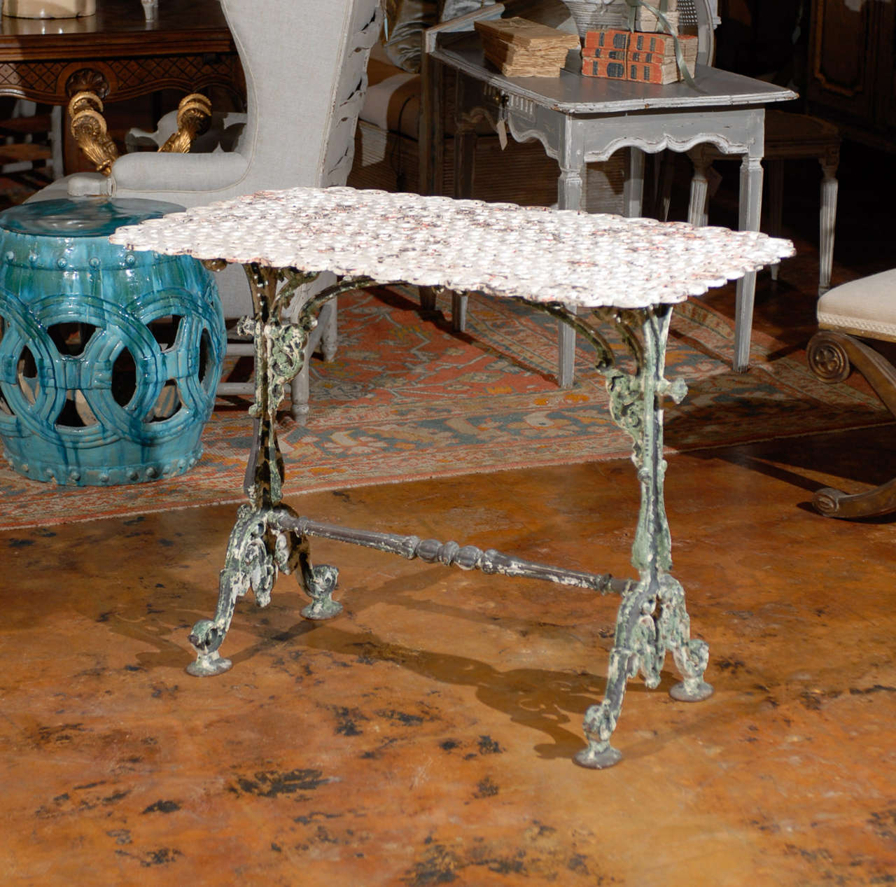 French wrought iron table with pierced top

To see more items from Foxglove Antiques, please visit our website: www.foxgloveantiques.com