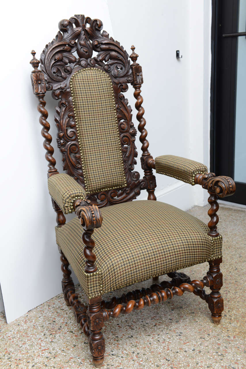 Hand Carved Throne Arm Chair, with Nailheads; heavily carved with barley twist details throughout, newly upholstered in Ralph Lauren fabric; original restored finish