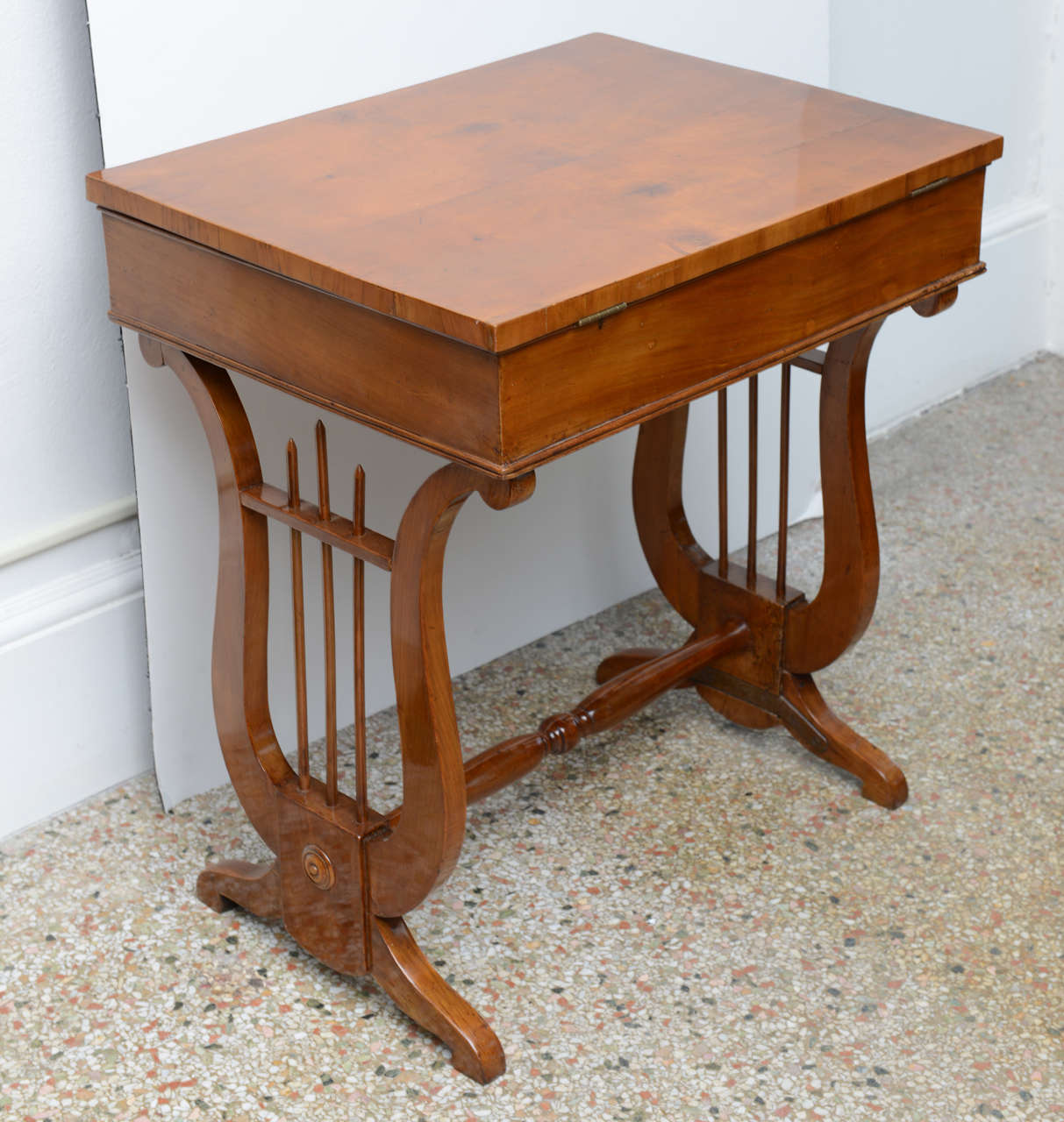 Antique Austrian Biedermeier Work Table with double lyre sides handcrafted in sherrywood with ebony & hinged top with compartments interior

Originally $ 5,800.00

In Central Europe, the Biedermeier era refers to the middle-class sensibilities
