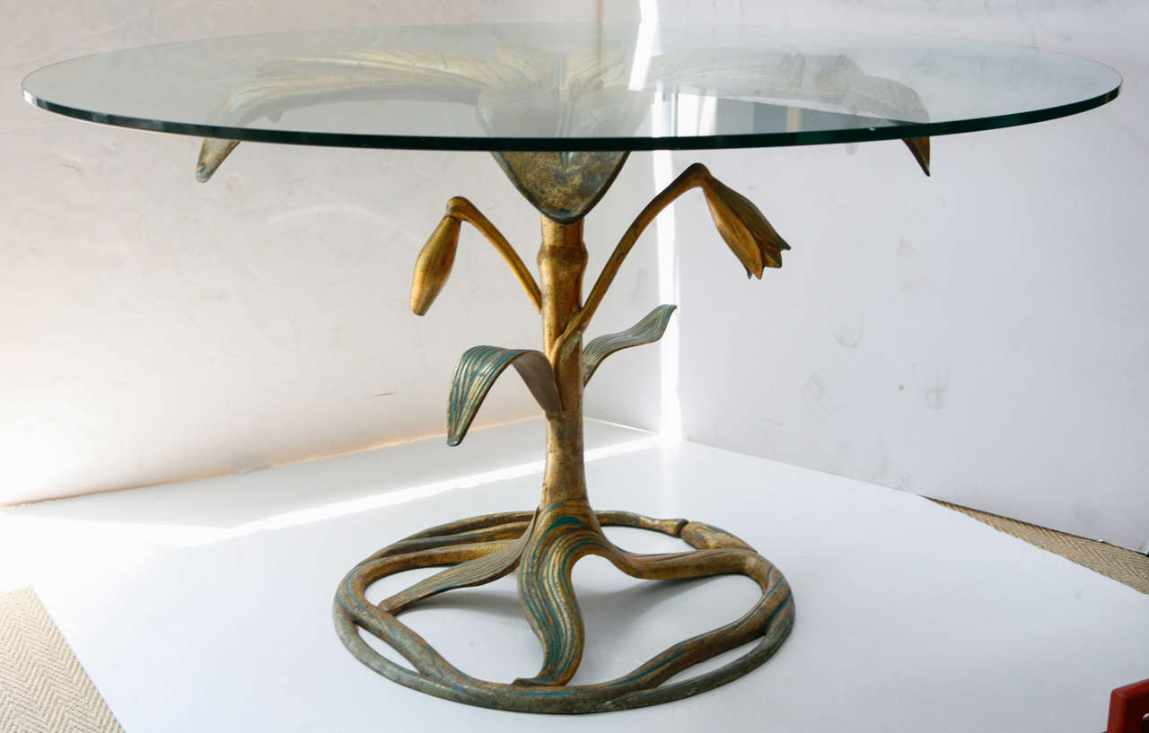 Decorative Art Nouveau and gilded aluminum Arthur Court lily table with glass top