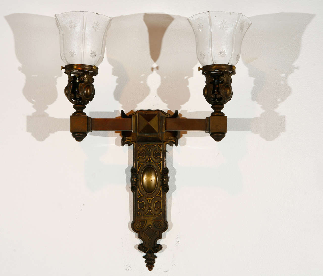 Pair of American double arm sconces; shades are not original to the fixture, but are of the period.
