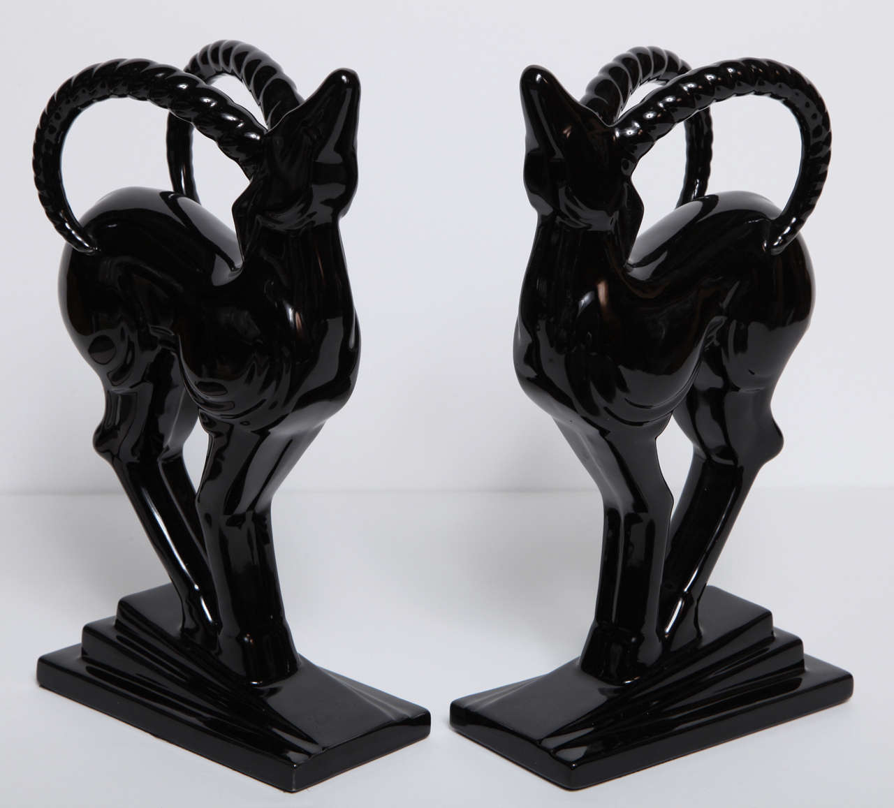 A lovely pair of Art Deco ceramic bookends in a high gloss finish.
