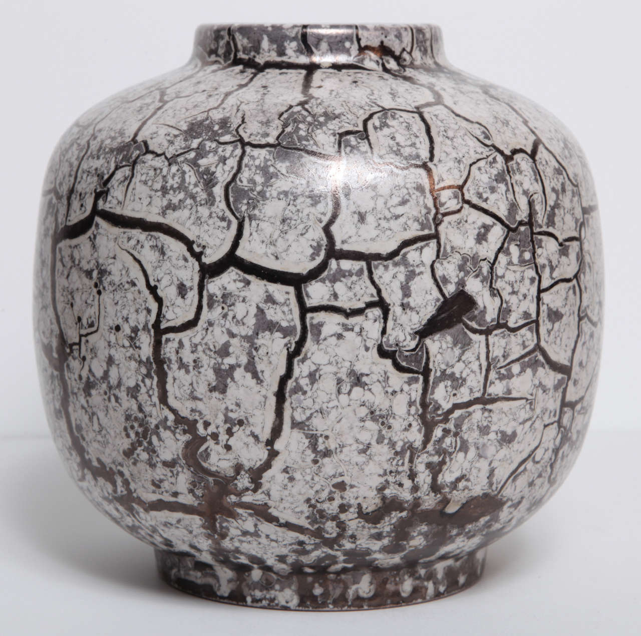 A West German Pottery ceramic vase with a stunning crackle glaze in grey and black. Numbered on bottom.