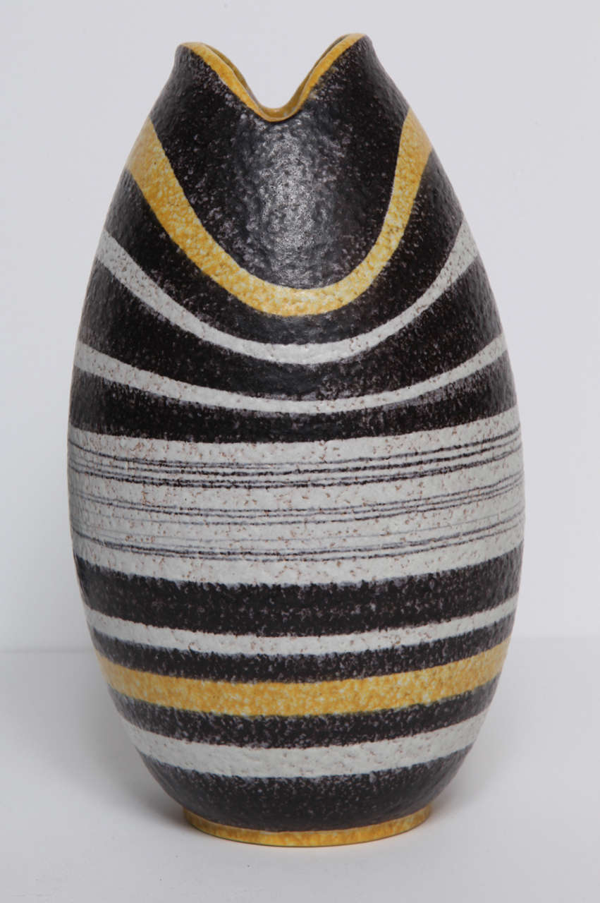 A Ruscha West German ceramic vase in a graphic pattern in shades of white, black and yellow. Signature on bottom.