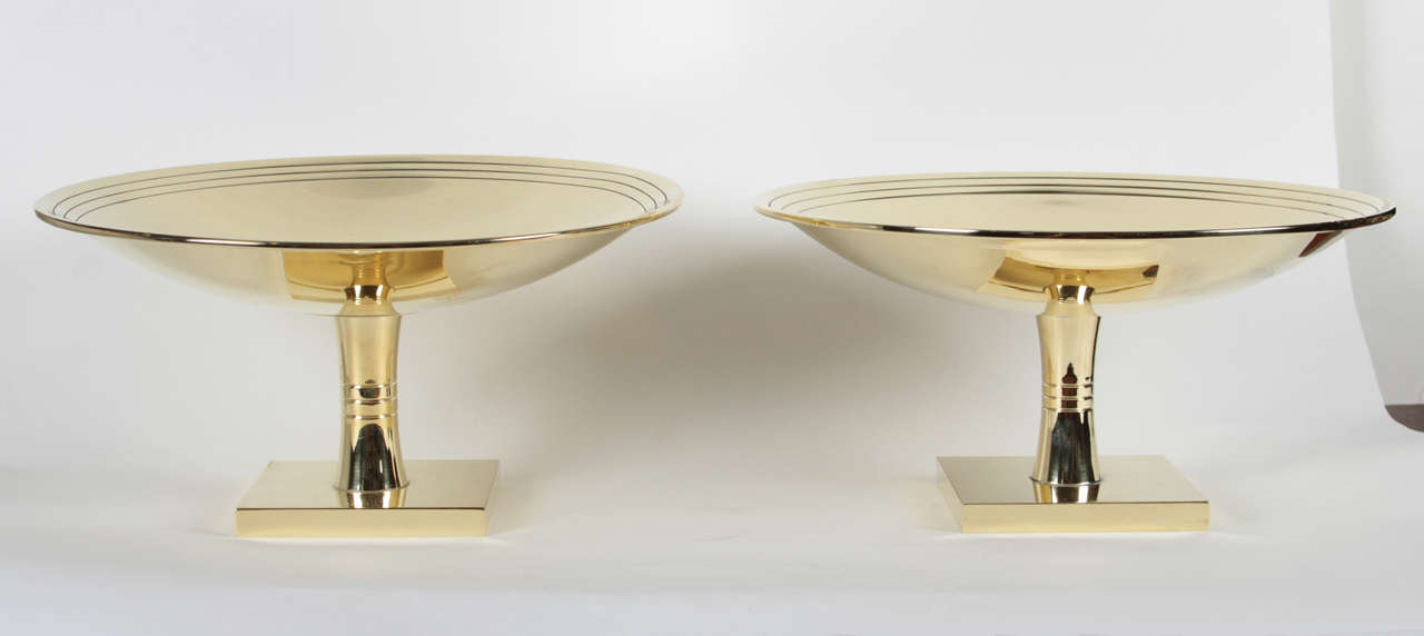 Mid-Century pair of polished brass compotes designed by Tommi Parzinger.