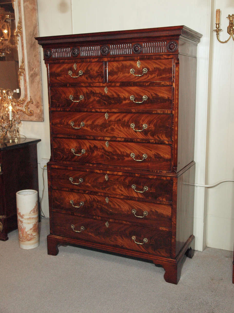 Antique English Georgian flame mahogany chest-on-chest.