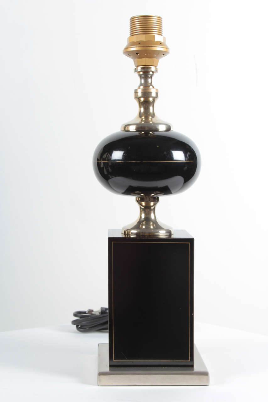 Pair of table lamps by Barbier. 
The lamps are lacquered black and in perfect condition. 

They have just been rewired to current standards.
