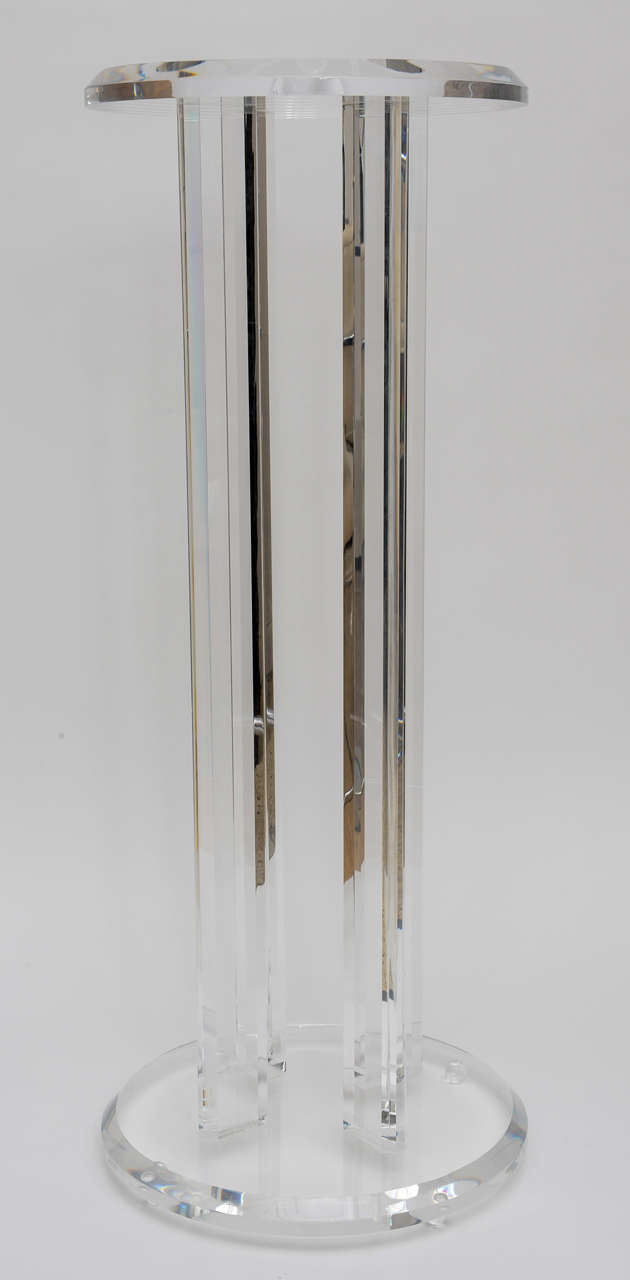 Tall, clear Lucite pedestal with beveled edges.

Pleas feel free to contact us directly for any additional information or a shipping quote by clicking 