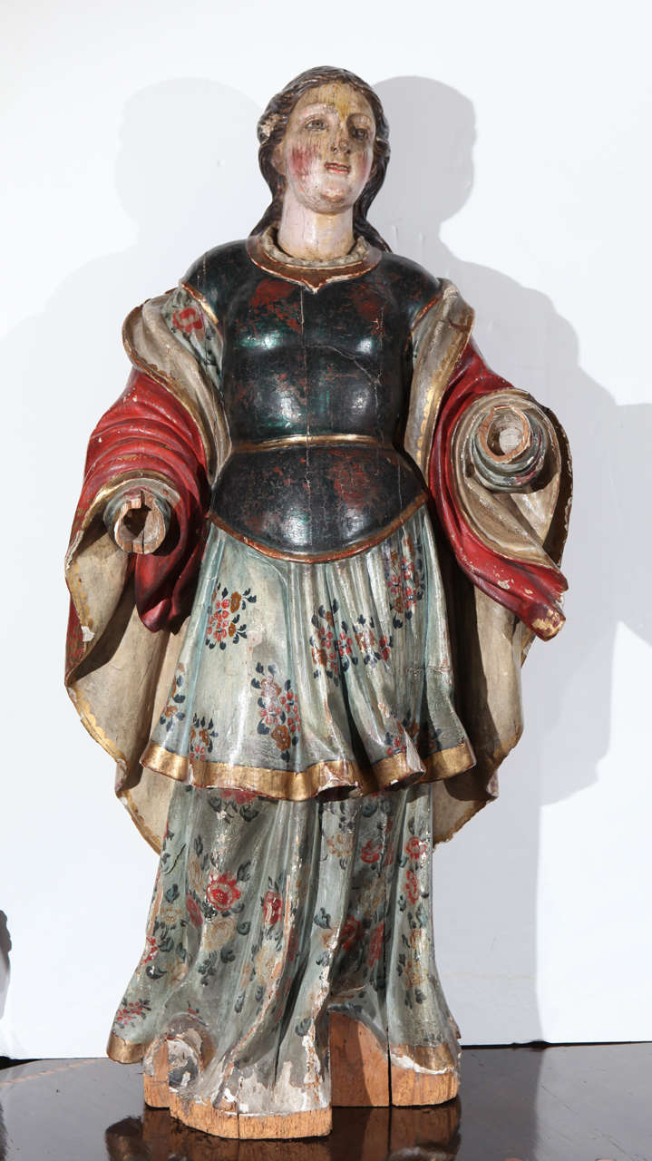 Hand-carved and painted, parcel gilt, Italian statue of a robed woman in an armored breast plate- probably a saint.